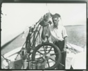 Image of Hubbard at wheel of Bowdoin